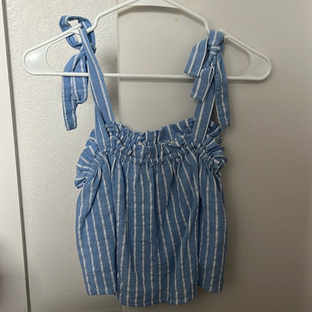 White and blue striped shirt